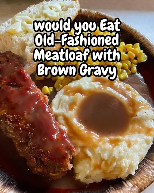 Old-Fashioned Meatloaf with Brown Gravy Old-fashioned meatloaf topped with brown gravy on a serving platter.