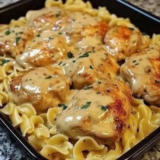 One-Pan Chicken with Creamy Buttered Noodles served in a skillet