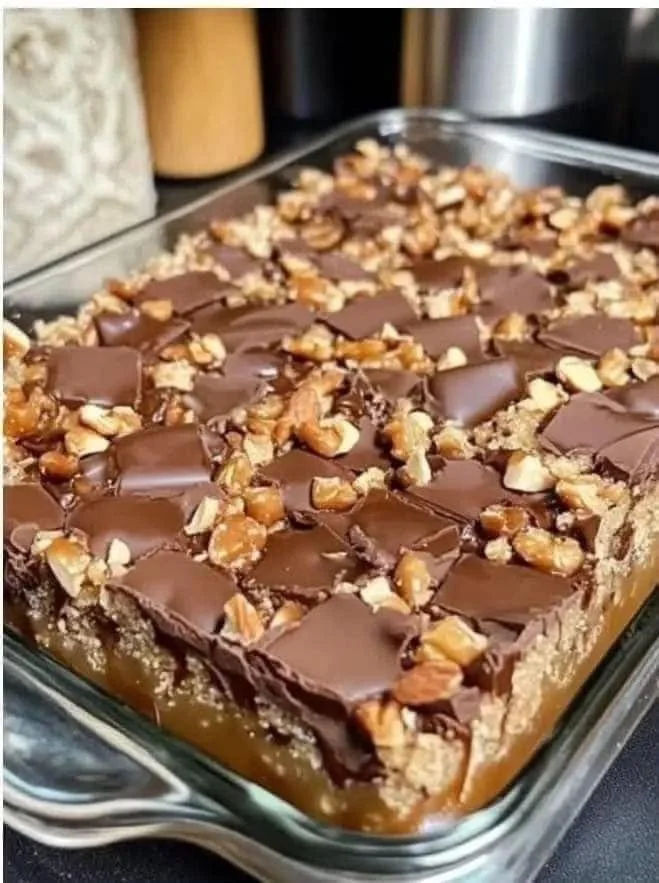 Caramel Chocolate Crunch Bars Delicious homemade Caramel Chocolate Crunch Bars stacked together.