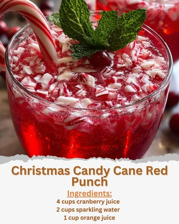 Christmas Candy Cane Red Punch Festive Christmas Candy Cane Red Punch in a glass with candy cane garnish.