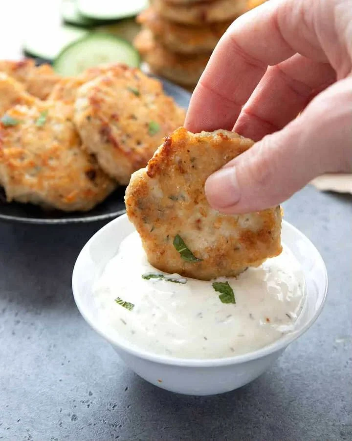 Keto Chicken Fritters Keto Chicken Fritters served on a plate with fresh herbs
