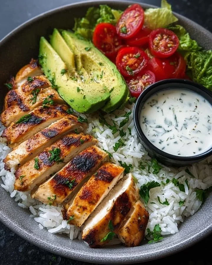 Grilled Chicken Avocado Rice Bowl Grilled Chicken Avocado Rice Bowl with fresh ingredients and vibrant colors
