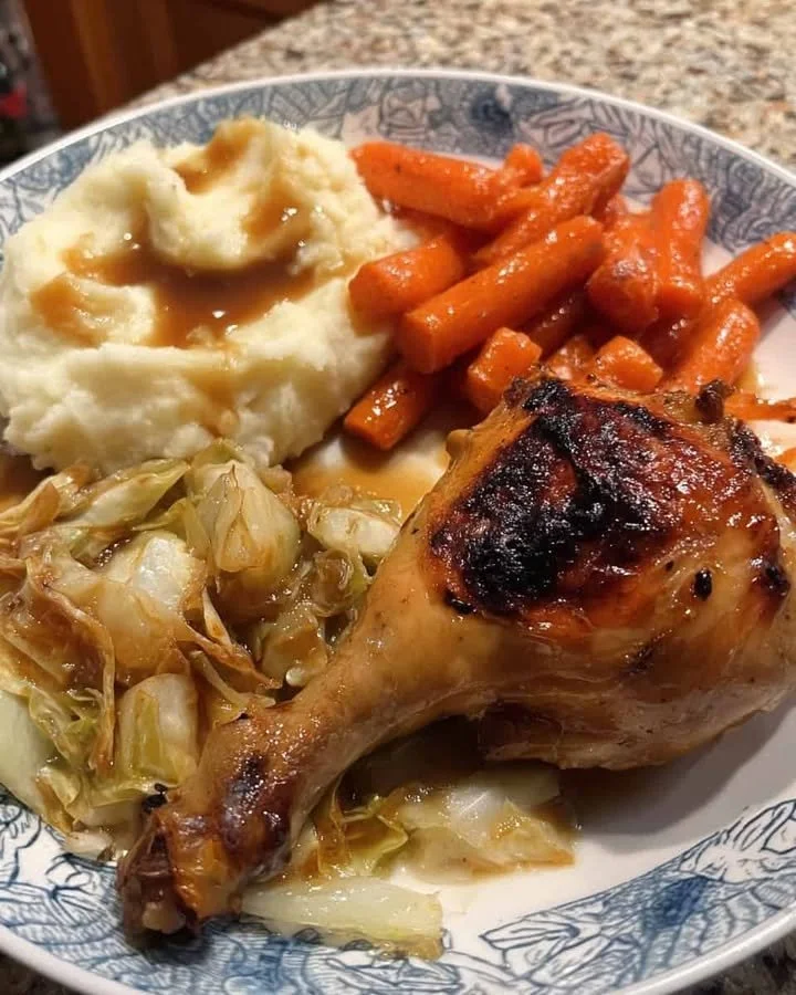 Homestyle Roast Chicken Plate with Creamy Mash & Glazed Carrots Delicious homestyle roast chicken plate with creamy mash and glazed carrots.