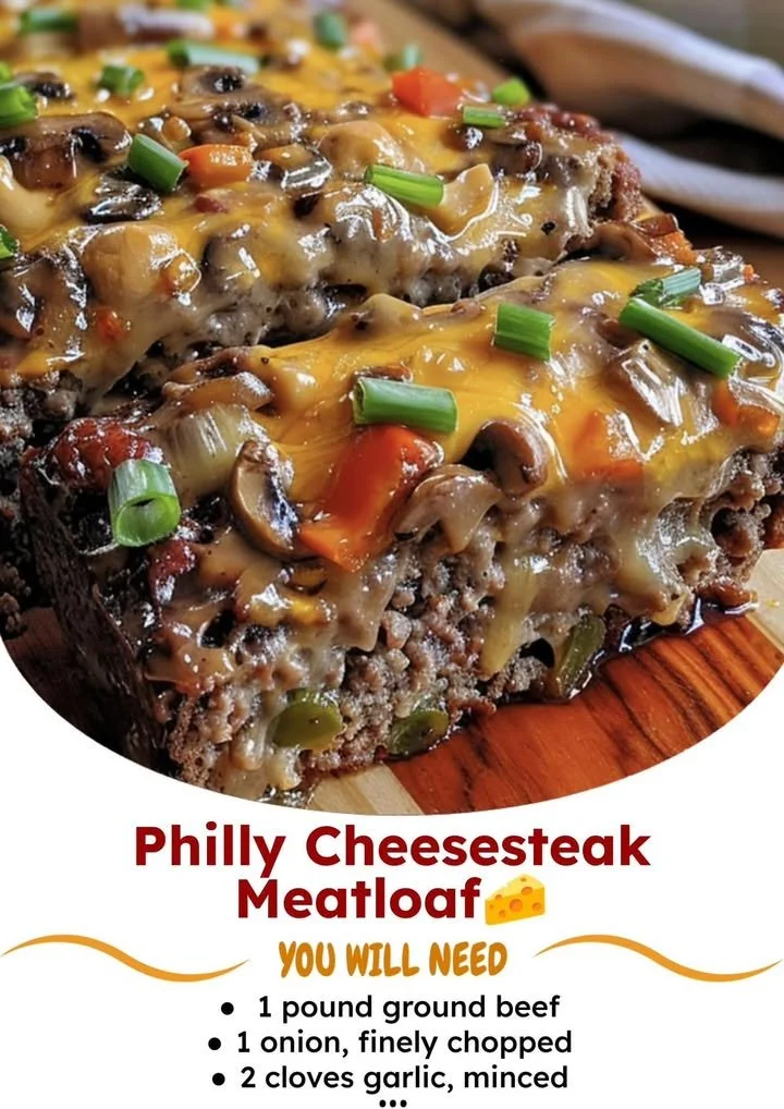 Philly Cheesesteak Meatloaf topped with cheese and peppers