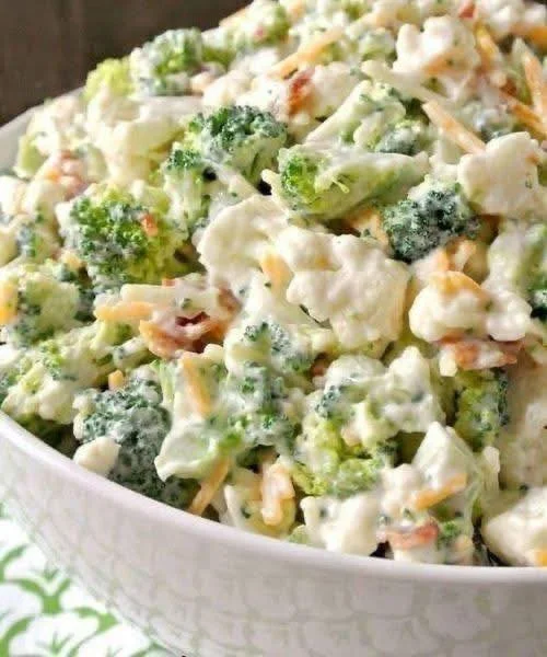 A vibrant and fresh simple salad made with mixed greens and colorful vegetables