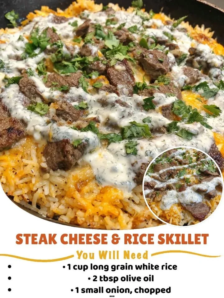 Steak Cheese Rice Skillet topped with melted cheese and colorful vegetables